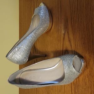 Gorgeous silver open toe pumps by Aldo